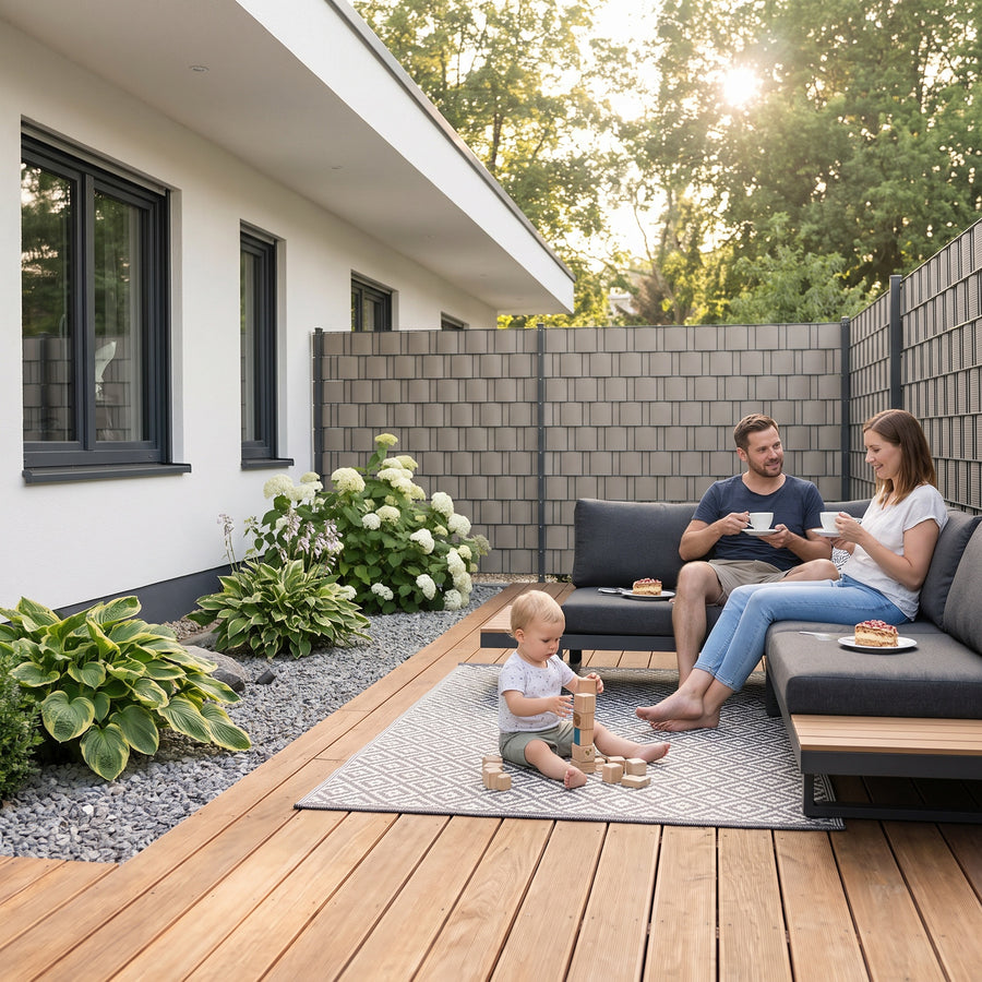 Double wire fence with WOVA rattan privacy screen strips in woven look